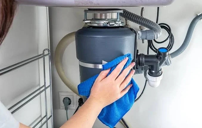 how to repair garbage disposal
