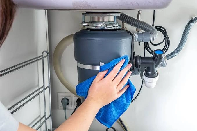 how to repair garbage disposal​