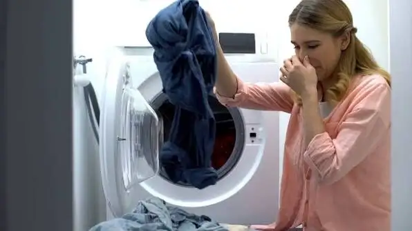 how to get mildew smell out of dryer