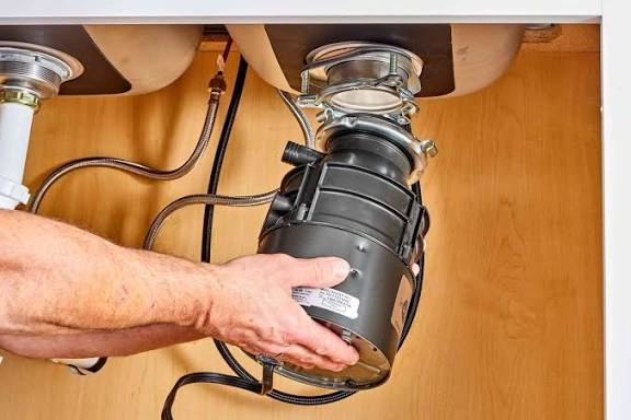 how to fix garbage disposal