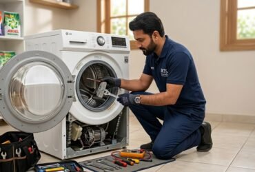 Technician checking a washing machine that is shaking violently during the spin cycle.